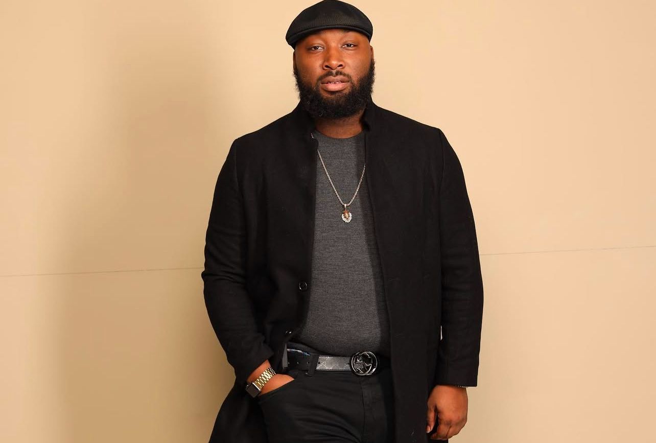 Portrait of Andre “Self” Burrell in a black coat and cap