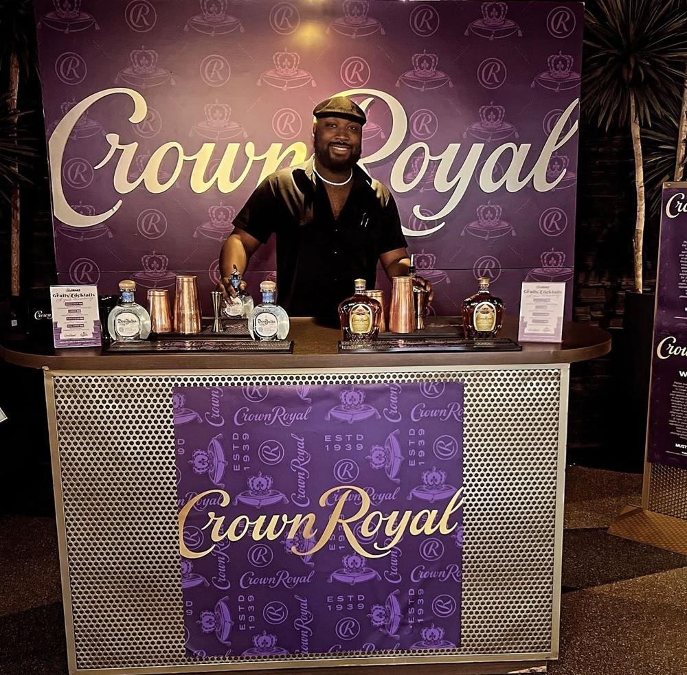 Self bartending at a Crown Royal event bar